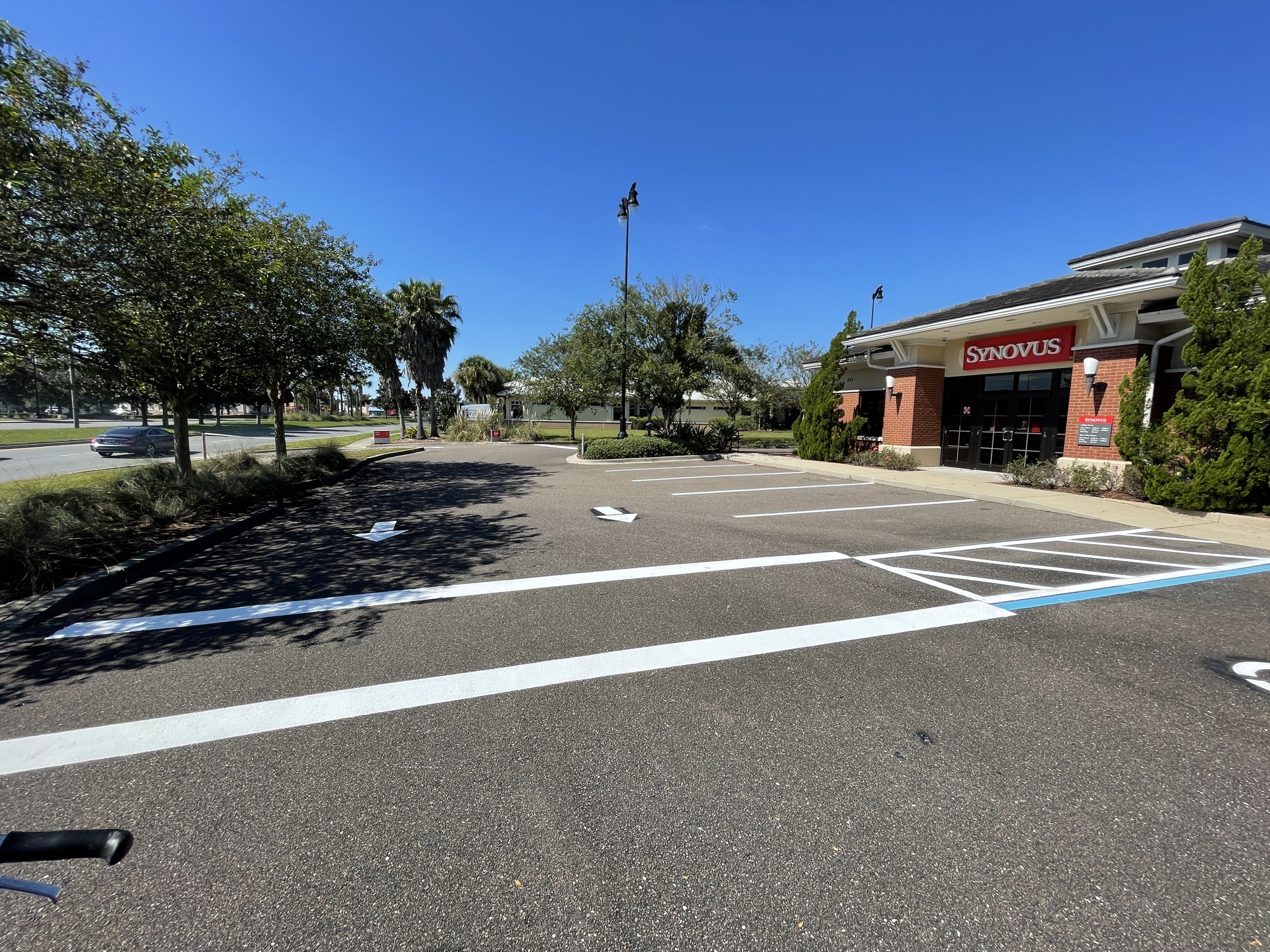 ADA accessible parking stalls with blue markings and handicap symbols